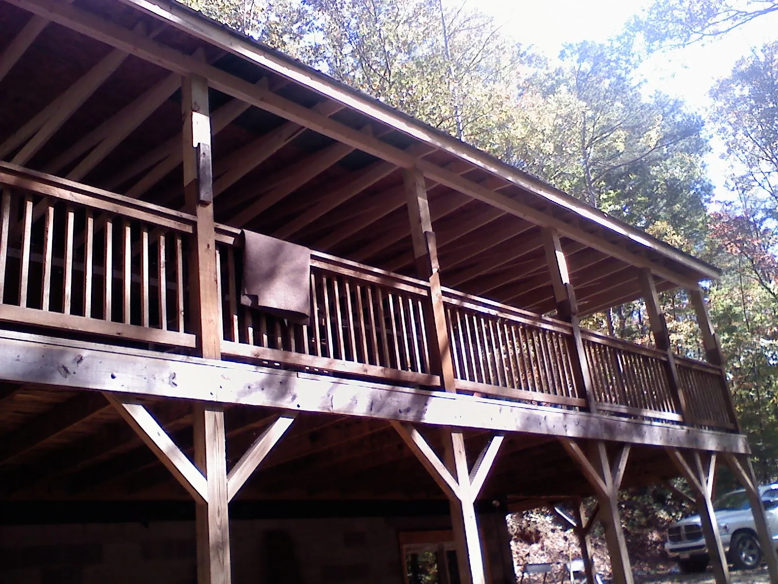 Timber framing under a new elevated porch and deck — Roof Leak Repair in Mifflinburg by Roofing Brothers